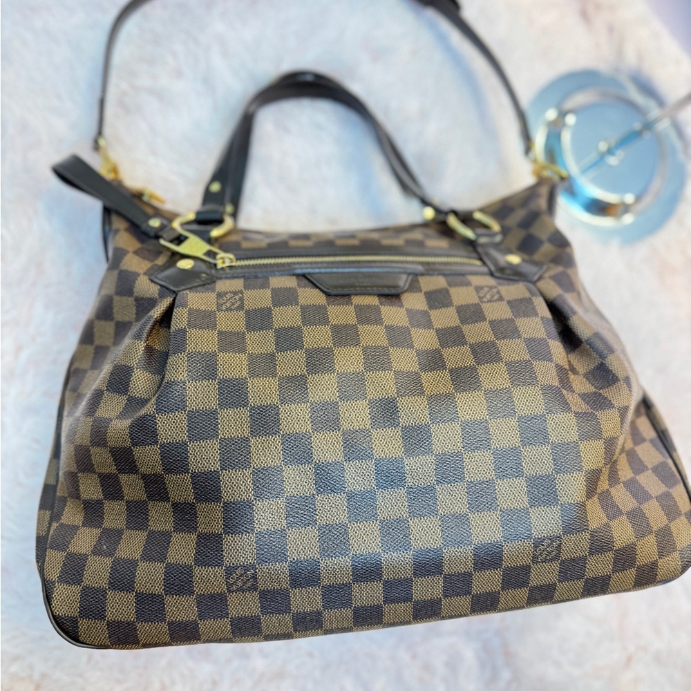 LOUIS VUITTON
Damier Canvas Evora MM Bag - Picture 6 of 12